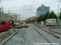Mezi Vápenkou a Strážní v Koněvově ulici již leží položené koleje. | 1.8.2006