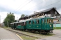 Tatranská Kometa (EMU 26.001) ev.č.22 s vlečnými vozy ev.č.12+16 v Tatranské Lomnici. | 11.7.2021