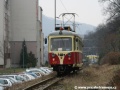 Motorový vůz 411 901-2 uhání po přeložce z osmdesátých let od zastávky Trenčianské Teplice, zastávka k zastávce Trenčianské Teplice, sídlisko. | 15.3.2009