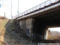 Most v Kolbenově ulici nad snesenou železniční vlečkou. | 24.3.2012