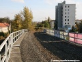 Štěrkové lože pro uložení železničních kolejí na železobetonovém mostě přes Podbabskou ulici tvořilo v souladu s mostem oblouk | 23.10.2010