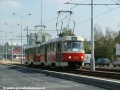 Souprava vozů T3SUCS ev.č.7026+7069 vypravená na linku 7 opustila zastávku Depo Hostivař, nazývané v době pořízení snímku Hutní základna. | 3.9.2004