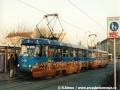 Souprava vozů T3SUCS ev.č.7254+7255 vypravená na linku 1 a opatřená zasněnou celovozovou reklamou na čokolády Orion stanicuje v zastávce Palmovka | 6.12.1997