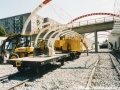 Zatím jedinými kolejovými vozidly na barrandovské trati jsou pracovní stroje. | 9.8.2003