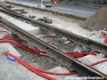 Vynechaný prostor v obnovené betonové desce pod rozjezdovou výhybkou na předjízdnou kolej křižovatky Letenský tunel pro uložení přestavníku. | 29.7.2007