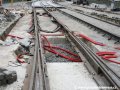 Vynechaný prostor v obnovené betonové desce pod rozjezdovou výhybkou na předjízdnou kolej křižovatky Letenský tunel pro uložení přestavníku. | 29.7.2007