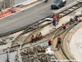 Na rekonstruované křižovatce Letenský tunel dochází k zádlažbě střední části a pokládání asfaltového krytu v prostoru předjízdné koleje. | 11.8.2007