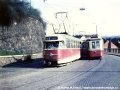 V Husově ulici se míjí vůz T2 ev.č.1470 na lince 10 se soupravou vozů MT4 a vleku na lince 13 | 1973