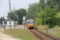 Souprava vozů T5C5 ev.č.4323+4349+4344 vypravená na linku 14 odbavuje cestující v konečné zastávce Káposztásmegyer, Megyeri út. | 25.6.2014