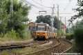 Souprava vozů T5C5 ev.č.4335+4267+4294 vypravená na linku 14 míří ke kolejovému rozvětvení u zastávky Rákospalota-Újpest vasútállomás. | 25.6.2014
