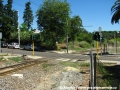 Před zastávkou Genneruxi je na přejezdu pozemní komunikace v předstihu položena druhá kolej, jezdí se zde však pouze po jedné koleji. Provoz na přejezdech je řízen SSZ s preferencí tramvají. | 27.7.2010