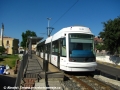 Snímek vozu č. CA 02 ze zastávky Redentore. Tramvaj míří do centra, tedy od fotografa. | 27.7.2010