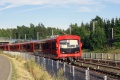 Souprava metra CAF M300 #311 na povrchovém úseku u stanice Rastila/Rastböle. | 1.8.2022