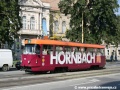 Před budovou muzea projíždí vůz T3 ev.č.405 na lince 4 opatřený celoplošnou reklamou Hornbach. | 7.8.2007
