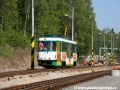 Vůz T3R.PLF ev.č.29 projíždí po stávající úzkorozchodné kolejí v Jablonecké ulici podél vznikající dvoukolejné a dvourozchodové přeložky. | 6.5.2011