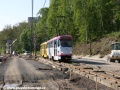 Souprava vozů T3m ev.č.31+32 projíždí jednokolejným úsekem tramvajové tratě v Jablonecké ulici v prostoru někdejší zastávky U lomu podél budované dvoukolejné a dvourozchodové přeložky. | 6.5.2011