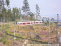 K Nové Poliance uhání oblouky tratě dvojice spřažených jednotek TEŽ 425 959-4+425 964-4 | 5.8.2007