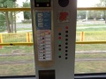 Automat na jízdenky v modernizovaném vozu Konstal 805NaND. Barevné puntíky jsou dobrý nápad do té doby, dokud někdo barvy nezpřehází. | 25.7.2014