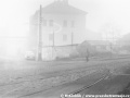 Špitálské náměstí. Podél stojících vozidel je stále vidět těleso kusé koleje k městským lázním. | podzim 1970?