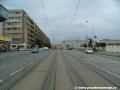 Tramvajová trať tvořená velkoplošnými panely BKV pokračuje středem ulice Milady Horákové k zastávkám Sparta podél stadionu stejnojmenného fotbalového klubu, vlevo odbočovaly koleje smyčky a následně jen vratného trojúhelníku Sparta