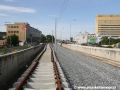 Kolejová pole jsou zatím uložená na sebe ve dvou vrstvách pro dočasnou možnost zachování průjezdu v místě koleje do centra. | 11.8.2011