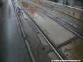 Zdeformovaná tramvajová trať v Národní ulici s podélnými žulovými prahy REMIS | 25.7.2010