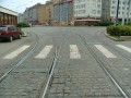 Rozvětvení tramvajové tratě od zastávky Libeňský most, levý oblouk směřuje k divadlu Pod Palmovkou, přímý směr do ulice Na Žertvách a pravý oblouk k Sokolovské ulici