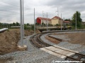 Vznikající kolejový oblouk, jímž se tramvaje ve smyčce Podbaba obrátí zpět. | 4.7.2011