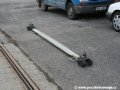 Osiřelá propojovací tyč, sloužící k vytažení vozů 14T z železničních vozů u předávací koleje Praha-Zličín | 9.2.2007