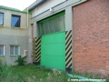Příliš nevyužívaná vrata tzv. nouzového výjezdu v sousedství objektu mistrů a garážmistrů. | 16.9.2004