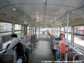 Spokojení cestující si čtou noviny a uhánějí městem Brnem v tramvaji T2 ev.č.1462 v soupravě ev.č.1470+1462 na lince 8 | 18.4.1998
