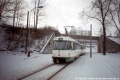 Podjezdem pod železniční tratí u zastávky Janův důl právě ve směru z centra projela souprava T3M.04 #78+#79. | 23.12.1998