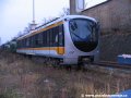 Prototypový vůz metra 6Mt vyrobený Škodou Transportation stojí odstavený bez využití pod širým nebem, z každé strany je opatřený jinou barevnou verzí laku | 28.11.2006