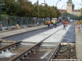 Přímý úsek tratě u vyústění Divadelní ulice je již podbetonovaný a je na něm zřizována první vrstva asfaltového zákrytu. | 29.7.2011