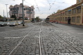 Pohled přes křižovatku Strojimport k zastávkách Želivského u metra. Zleva se připojují do Vinohradské ulice oblouky z ulice Jana Želivského, přímý směr míří od zastávek Želivského u Strojimportu.