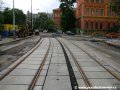 Rekonstruovaná tramvajová trať ve Svobodově ulici s nově položenými velkoplošnými panely BKV v části úseku navazujícím na prodloužený úsek tramvajové tratě v klasické stavbě oproti původnímu stavu. | 23.6.2007