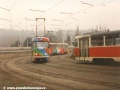 Souprava vozů T3 ev.č.6431+6434 na lince 36 projíždí ve smyčce Nádraží Braník podél odstavených vozů. | 5.3.1997