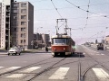 Souprava vedená vozem T3 ev.č.6543 vypravená na tehdejší domovskou linku 11 projíždí po nové trati okolo smyčky Červený Vrch, na trolejích jsou ještě patrné konstrukce pro provoz tyčových sběračů. | 1968