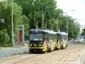 Souprava vozů T3 ev.č.6776+6777 vypravená na linku 10 a opatřená celovozovou reklamou LG míjí při jízdě k zastávce Krematorium Motol prostor, kde do roku 1974 končily tramvaje na kolejovém přejezdu. | 17.8.2004