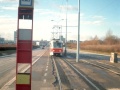 Do zastávky Malešická továrna vjíždí souprava vozů T3 ev.č.6932+6432 vypravená na linku 11. | 14.12.1997