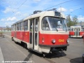 Odstavený vůz T3 ev.č.6948 z roku 1976 na koleji před objektem oděvního skladu. | 21.4.2012