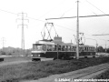 Souprava vozů T3 ev.č.6973+6531 vypravená na linku 22 míří původní podobou Bělohorské ulice, kdy protisměrné koleje oddělovalo několik metrů a vozovka byla jen na jedné straně, od Vypichu na Malý Břevnov. | 18.5.1974