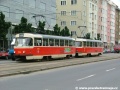 K zastávce Želivského míří souprava vozů T3SU ev.č.7019+T3 ev.č.6525 vypravená na linku 11. | 18.6.2004