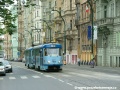 Souprava vozů T3SUCS ev.č.7023+T3 ev.č.6640 vypravená na linku 22 uhání Masarykovým nábřežím k zastávce Jiráskovo náměstí | 15.5.2004