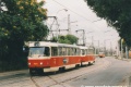Souprava vozů T3SUCS #7061+7044 překonává v popovodňovém období na lince 21 vlečku do areálu Lihovaru u stejnojmenné zastávky. | 16.9.2002