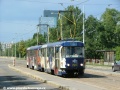 Souprava vozů T3SUCS ev.č.7272+7283 vypravená na linku 1 a opatřená celoplošnou reklamou na čokolády Orion vjíždí do zastávky Libeňský most | 20.8.2006