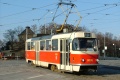 Vůz T3M #8006 (ex T3 #6798) vypravený vozovnou Hloubětín na linku 19 odbočuje křižovatkou Strojimport k zastávkám u metra. | 26. 2. 2006