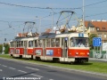 Souprava vozů T3M ev.č.8064+8085 vypravená na linku 8 projíždí zatravněným úsekem tramvajové tratě mezi křižovatkami Hradčanská a Špejchar za dozoru admina Petra. | 9.5.2012