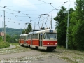 Vjezdovým trojúhelníkem vozovny Hloubětín projíždí k Novému Hloubětínu míří souprava vozů T3M ev.č.8102+8061 vypravená na linku 4. | 26.7.2004