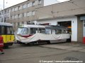 Rodící se vůz T3R.PLF ev.č.8251 při posunu vozem T3M ev.č.5550 v Opravně tramvají Ústředních dílen. | 13.12.2006